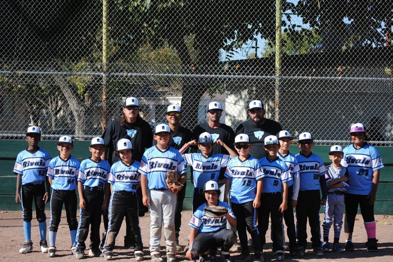Rivals youth baseball team in custom light blue Capra uniforms