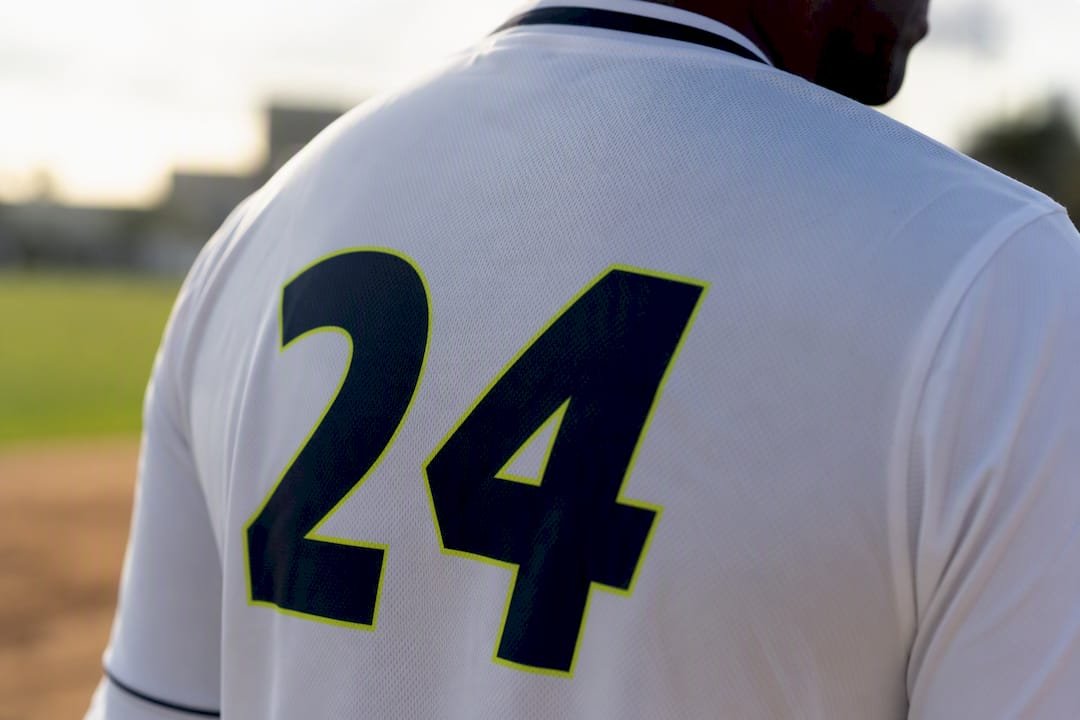 Curved jersey panel with script font numbers close-up