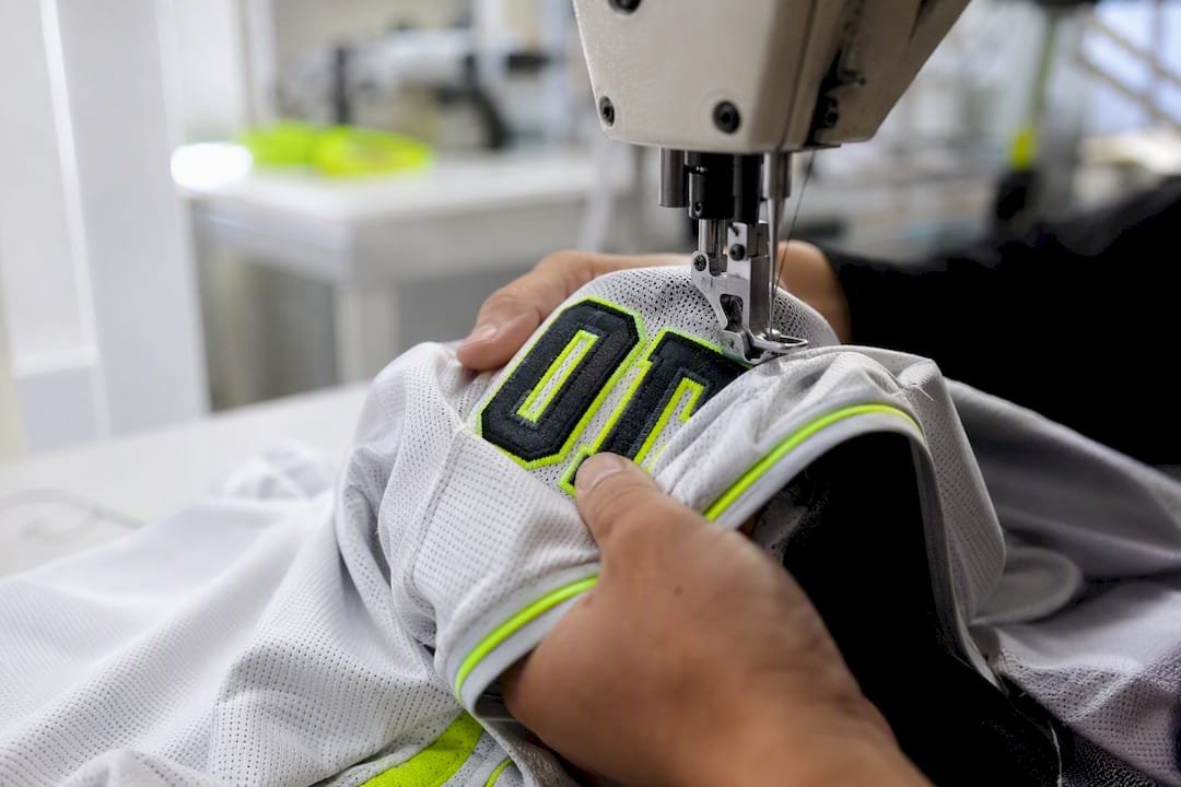 Close-up of block varsity jersey lettering on fabric