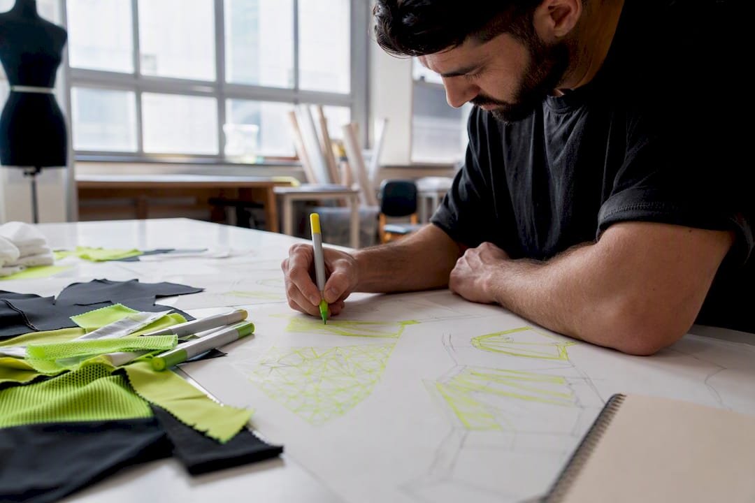 Designer sketching basketball uniform pattern