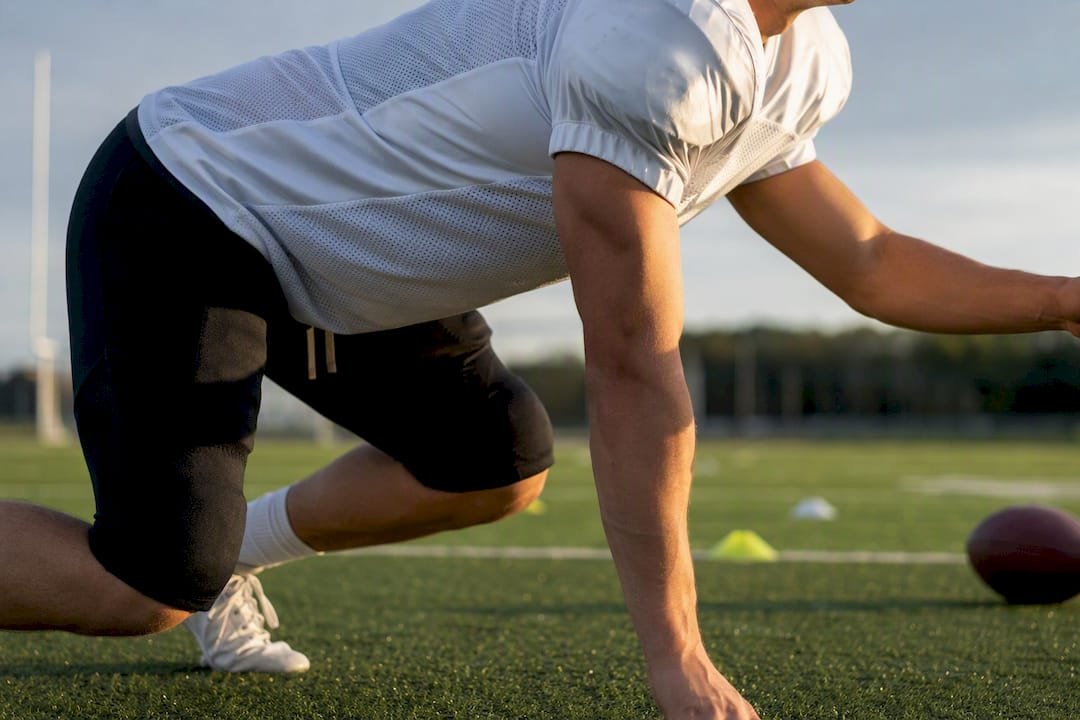 Padded athlete testing jersey movement
